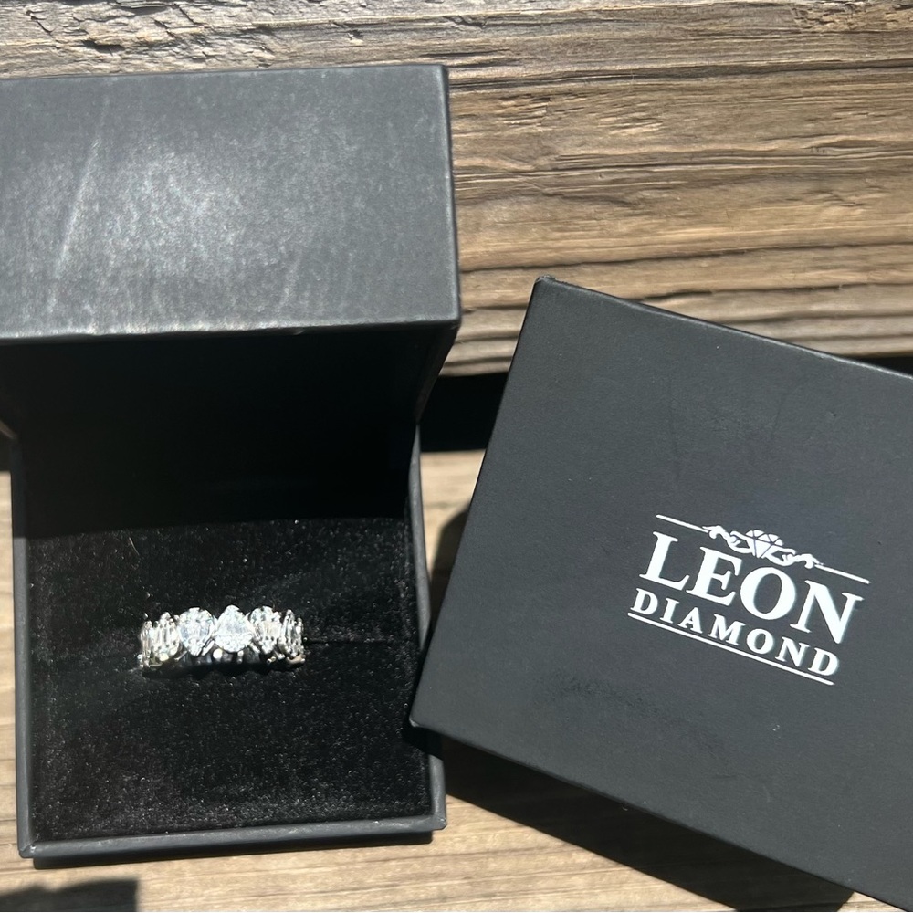 New Never worn 14kt White Gold and Diamond Ring